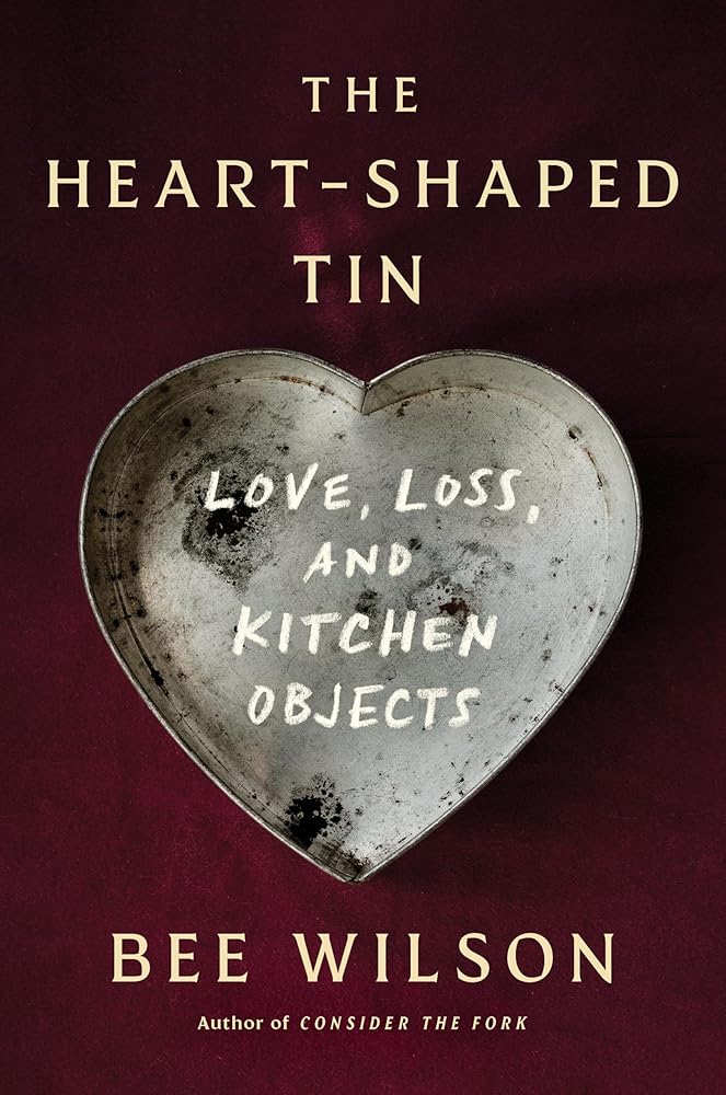 The Heart-Shaped Tin: Love, Loss, and Kitchen Objects cover image